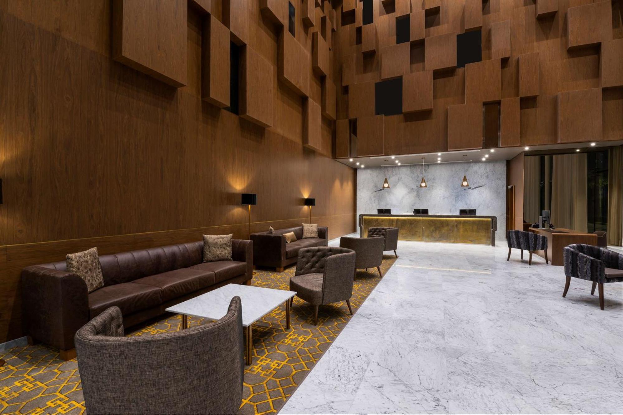Aleph Doha Residences, Curio Collection By Hilton Exteriér fotografie The lobby of the hotel